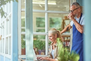 middle-aged-caucasian-spouses-working-with-laptop-2023-11-27-05-28-43-utc