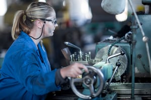 woman-operating-machine-in-workshop-2024-09-16-11-08-49-utc