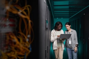 women-managing-servers-in-data-center-2023-11-27-05-26-37-utc